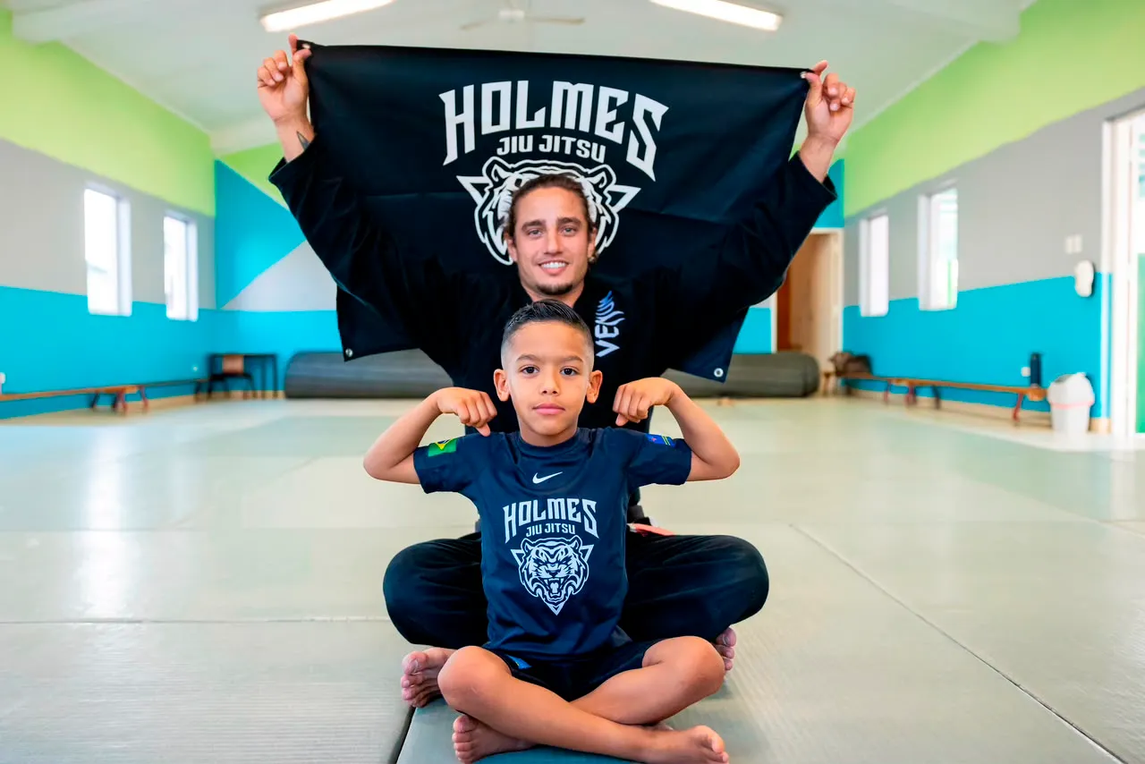 Coach Nicolas and a Holmes student