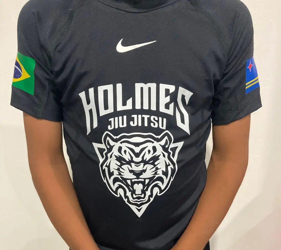 Holmes tee with Aruba and Brazil flags
